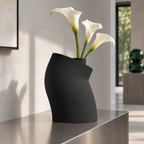 Curva Sculptural Vase – black lifestyle steel entry curva sculptural vase